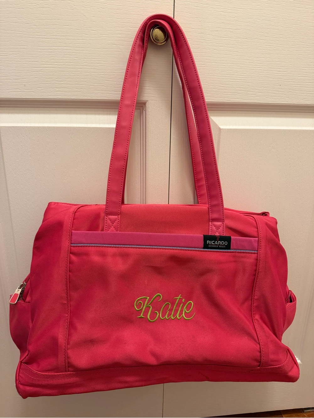 Persosonalized “Katie” bright pink Ricardo Beverly Hills travel tote bag